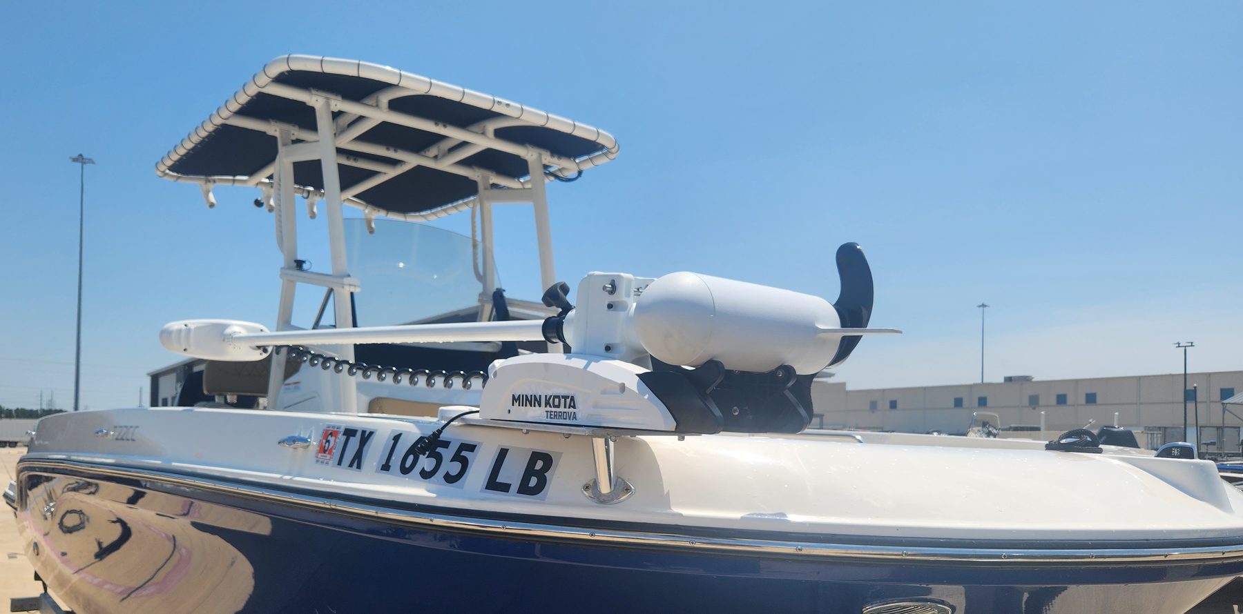 The Salty Shorthair — a navy-hulled Trophy T22CC center console with a white T-top